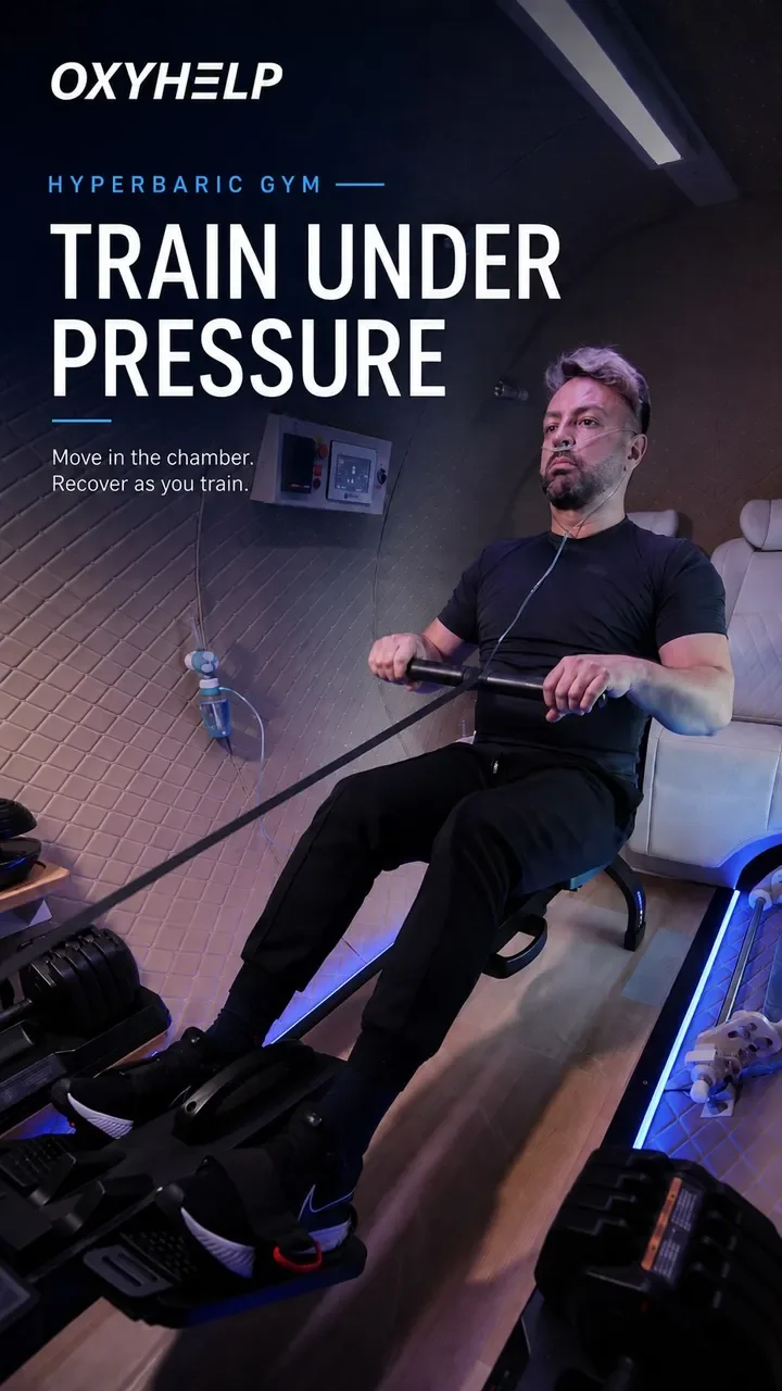 Man on a rowing machine inside a hyperbaric gym chamber, under the title Train under pressure